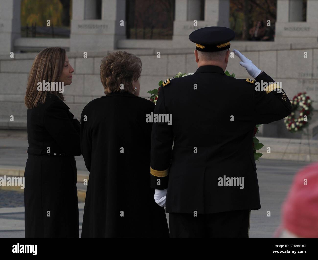 December 10, 2021, Washington, District of Columbia, USA: Robin Dole, Elizabeth Dole and General Mark Miller stand in front of a wreath honoring the late Senator Bob Dole at the World War II Memorial on the National Mall. (Credit Image: © Sue Dorfman/ZUMA Press Wire) Credit: ZUMA Press, Inc./Alamy Live News Stock Photo