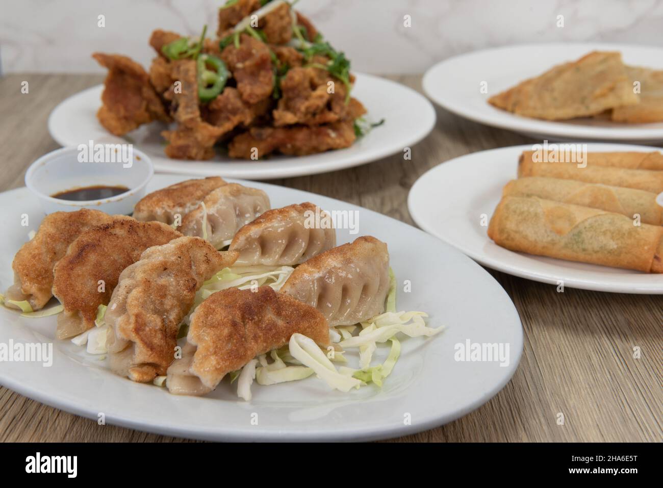 Hearty Chinese food fills the table with the crispy deep fried pot