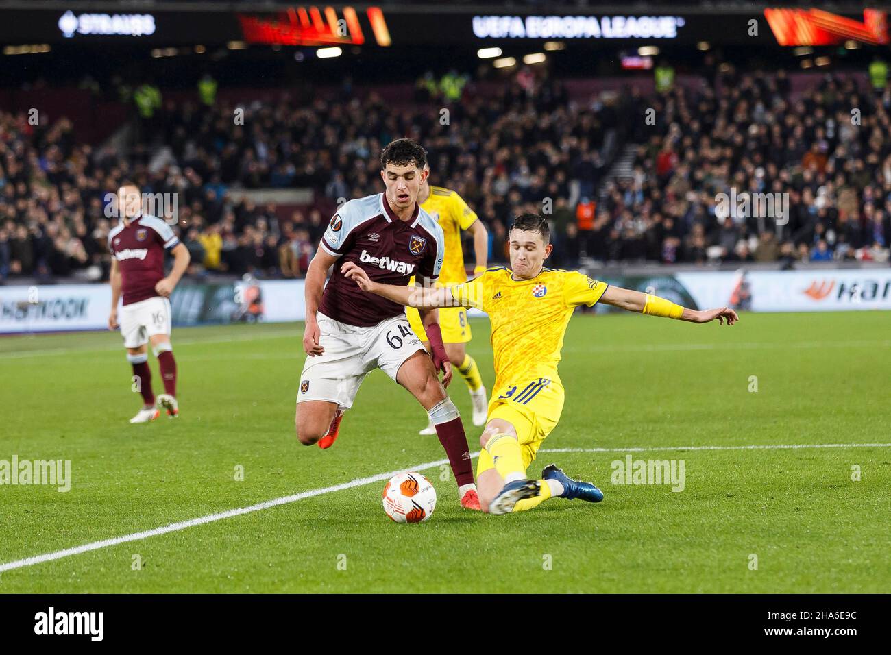 London, UK. 09th Dec, 2021. Sonny Perkins of West Ham United is tackled by Daniel Stefulj of Dinamo Zagreb during the UEFA Europa League Group H match between West Ham United and Dinamo Zagreb at London Stadium on December 9th 2021 in London, England. (Photo by Daniel Chesterton/phcimages.com) Credit: PHC Images/Alamy Live News Stock Photo