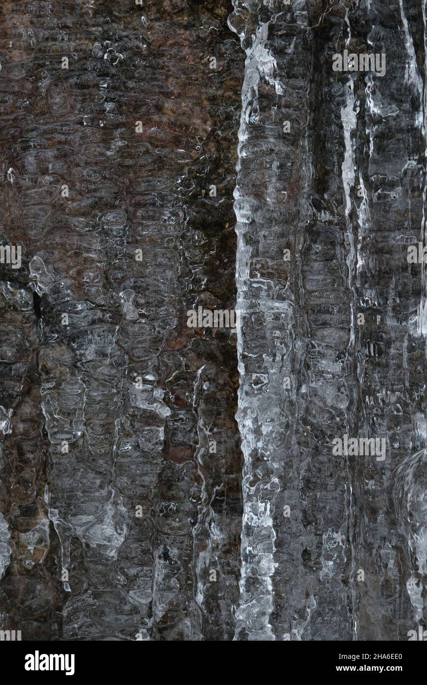Ice covering the mountain rock Stock Photo