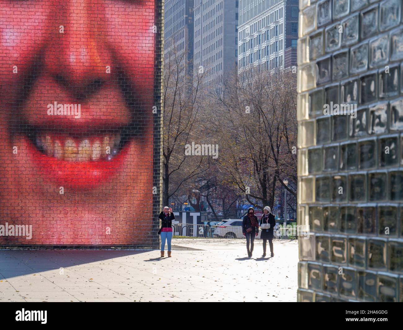 Crown Fountain and three people, Millennium Park, Chicago, Illinois, Turned off for winter Stock Photo