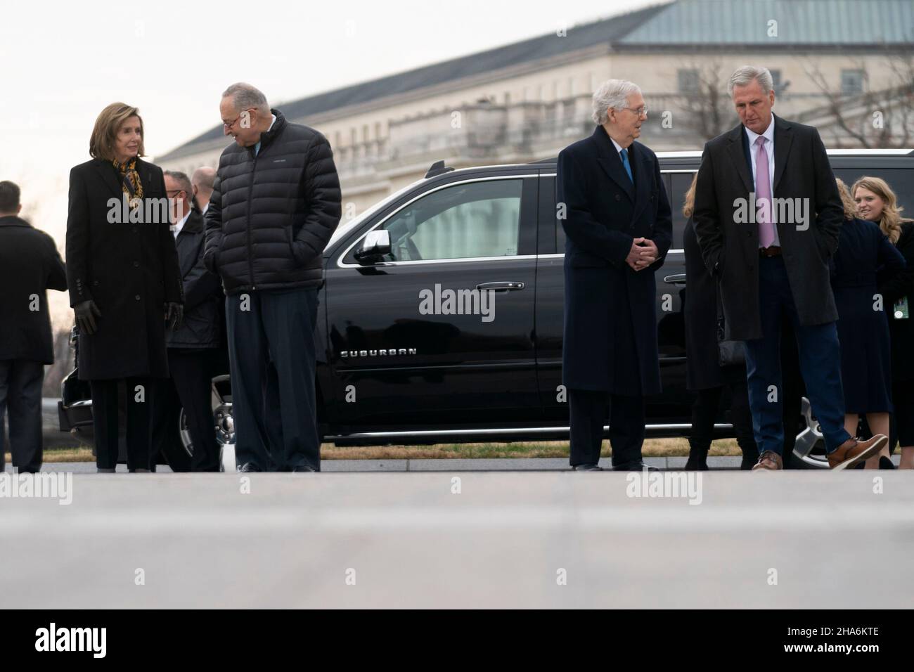 Washington, DC. 10th Dec, 2021. Speaker Nancy Pelosi (D-Calif.), Majority Leader Charles Schumer (D-N.Y.), Minority Leader Mitch McConnell (R-Ky.) and House Minority Leader Kevin McCarthy (R-Calif.) are seen before a military honor guard carries the casket of Sen. Bob Dole (R-Kan.) after lying in state at the U.S. Capitol in Washington, DC, on Friday, December 10, 2021. Dole will be taken to Washington National Cathedral for a funeral service. Credit: Greg Nash/Pool via CNP/dpa/Alamy Live News Stock Photo