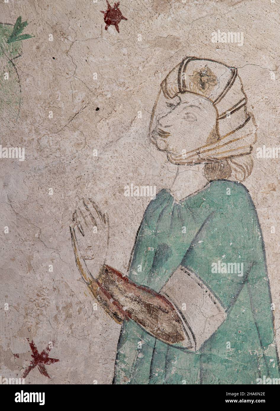 Medieval fresco of a woman in an ancient dress and an old headgear, Bollerup, Sweden, September 15, 2021 Stock Photo