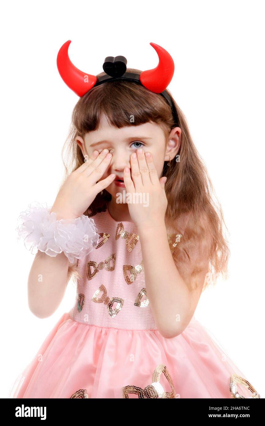 Sad Little Girl with Devil Horns on the White Background Stock Photo ...