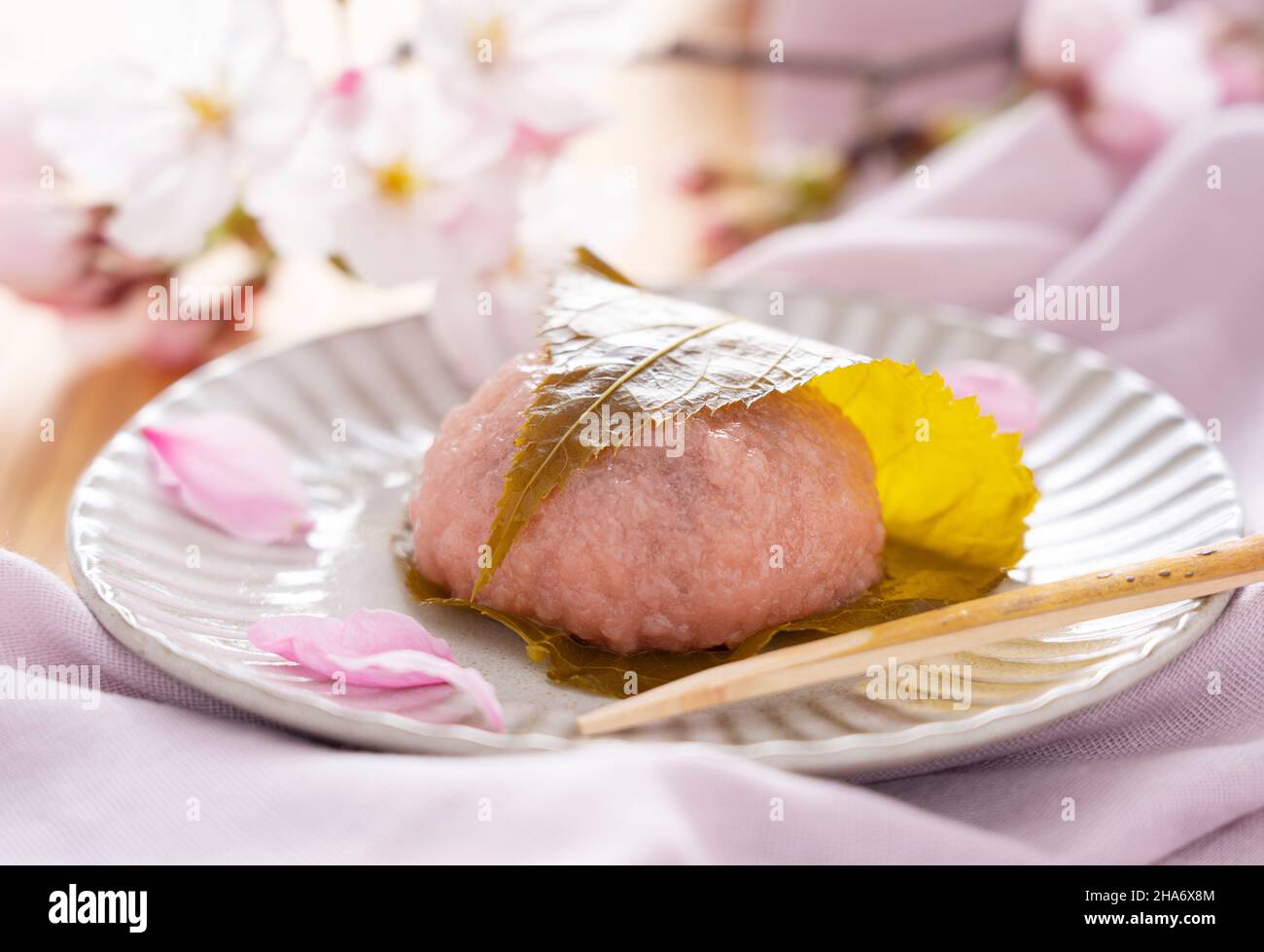 rice cake with bean paste wrapped in a preserved cherry leaf.Japanese ...