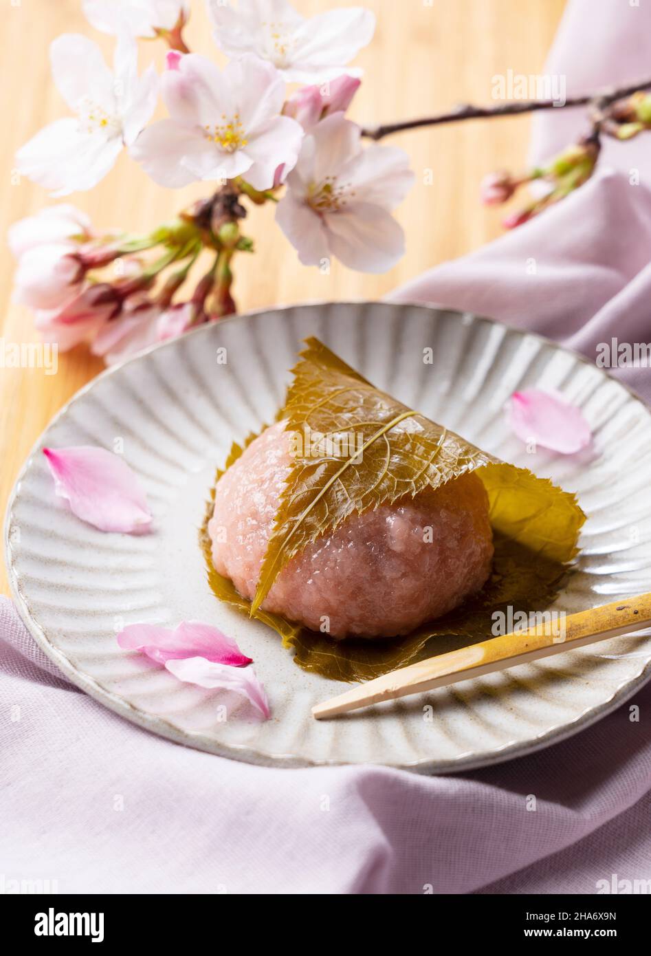 rice cake with bean paste wrapped in a preserved cherry leaf.Japanese ...