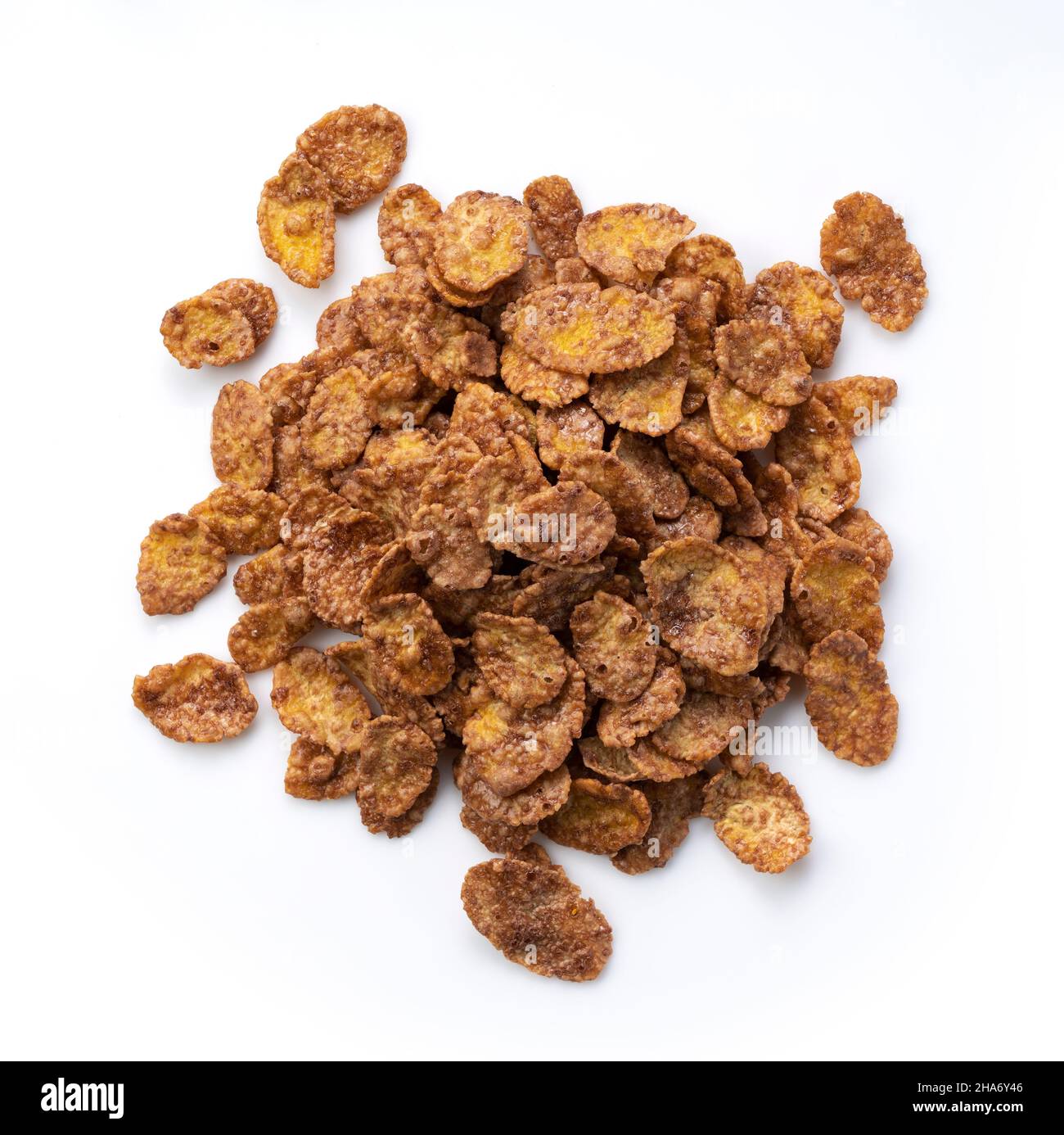 Chocolate cornflakes placed on a white background. View from directly above. Stock Photo