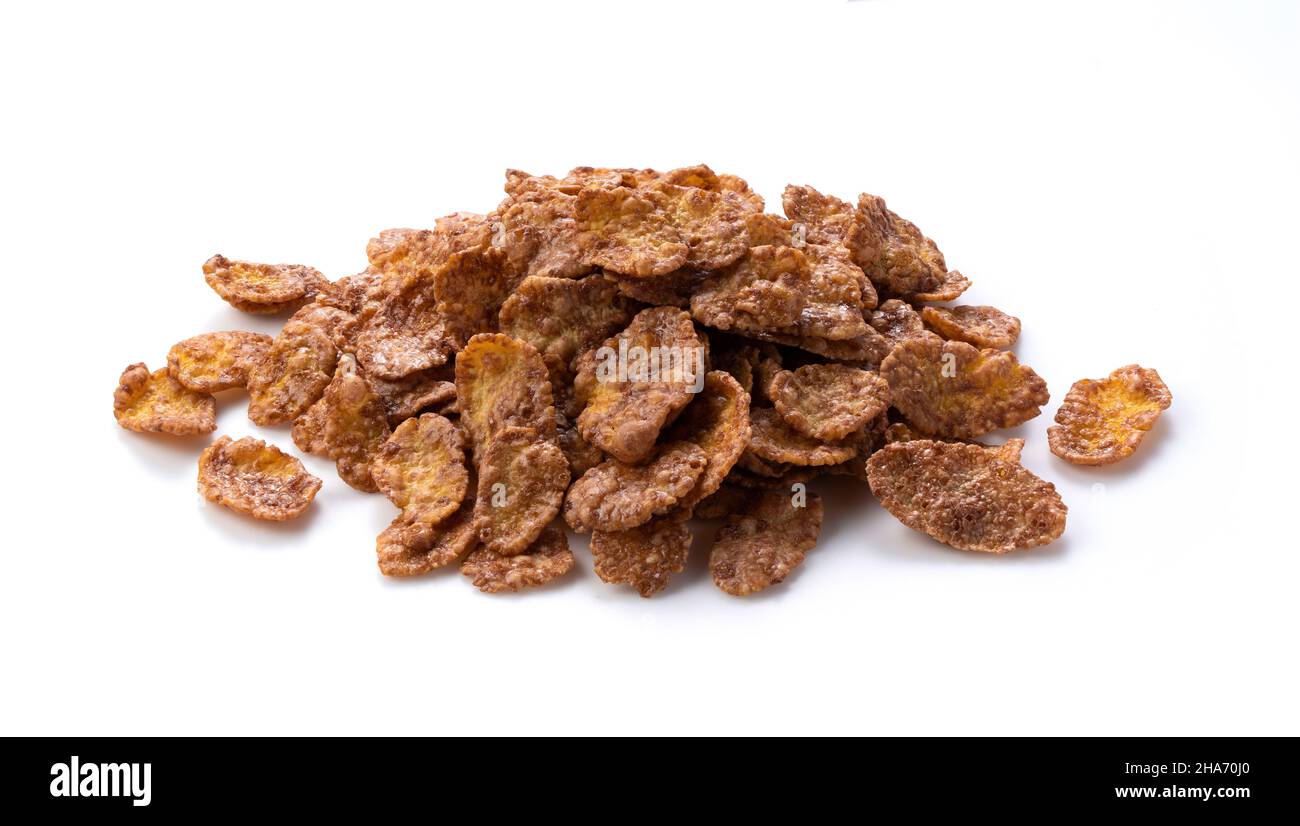 Chocolate cornflakes on a white background. Focus Composition Stock Photo