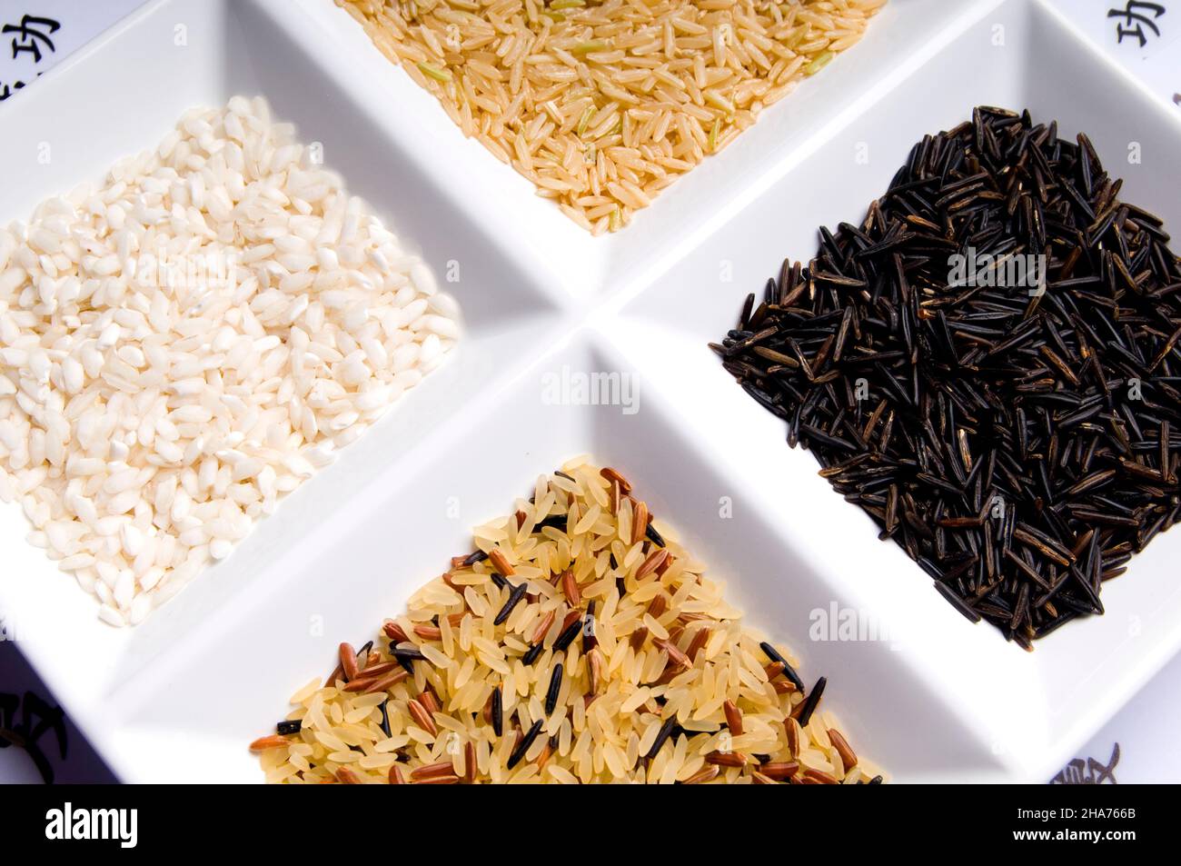 four kinds of rice in beautiful white bowl Stock Photo - Alamy