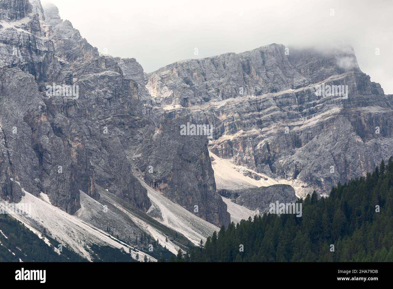 Italian Dolomites mountains covered with low clouds Stock Photo - Alamy
