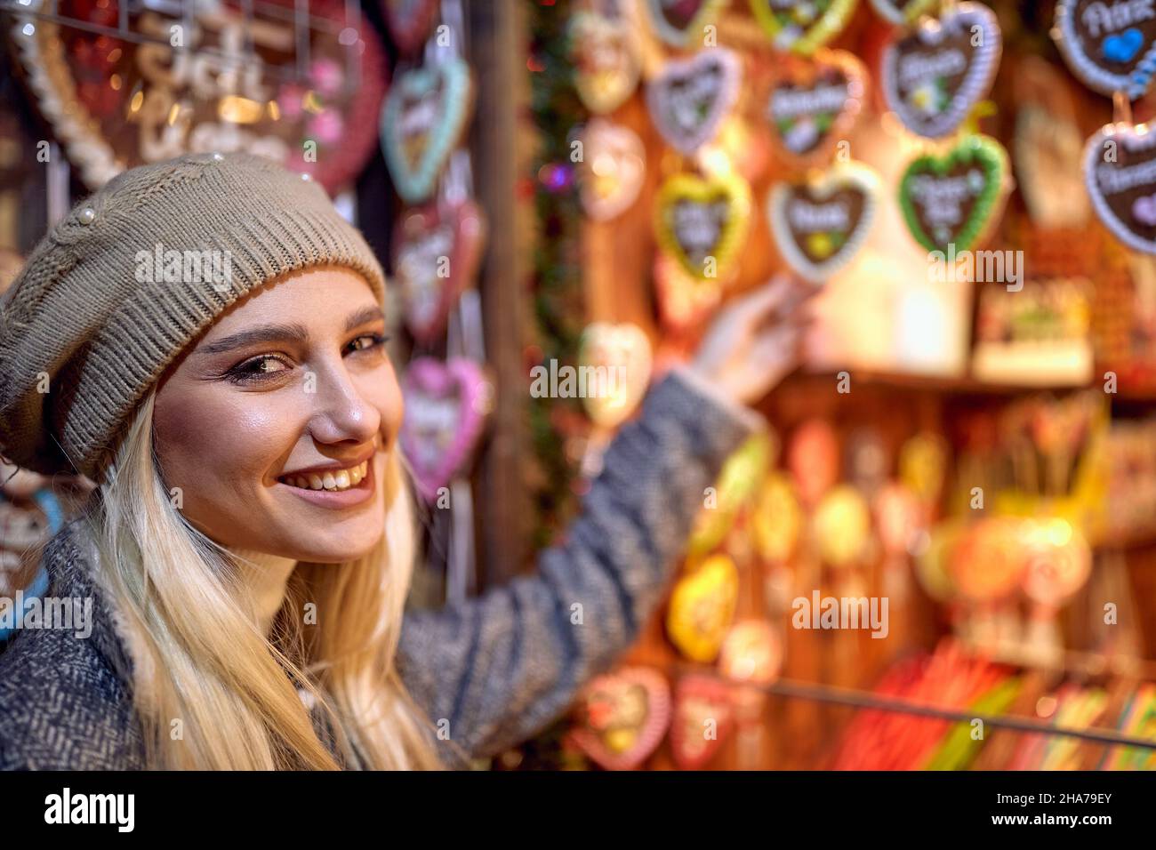 happy smiling girl  shopping at festive street market Stock Photo