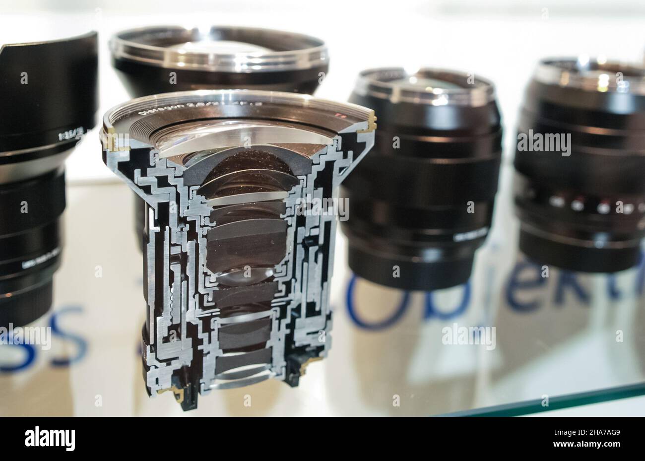 Cologne, Germany, September 2010. Cross-section of Carl Zeiss lens on display at the Photokina trade fair for the photographic and imaging industry Stock Photo