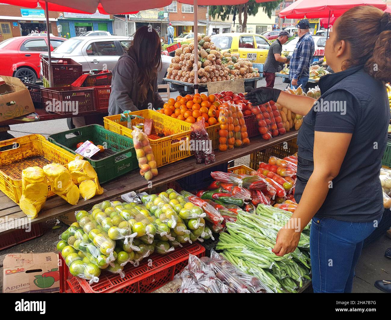 BOGOTA, COLOMBIA - Mar 05, 2018: A marketplace with people sell and buy fruits in Bogota, Colombia Stock Photo
