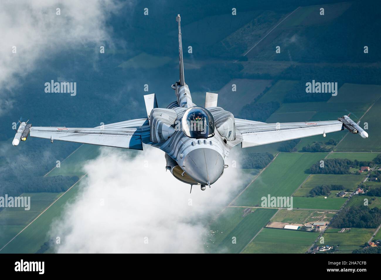 A F-16 Fighting Falcon fighter jet from the 31st Tactical Air Base of the Polish Air Force. Stock Photo