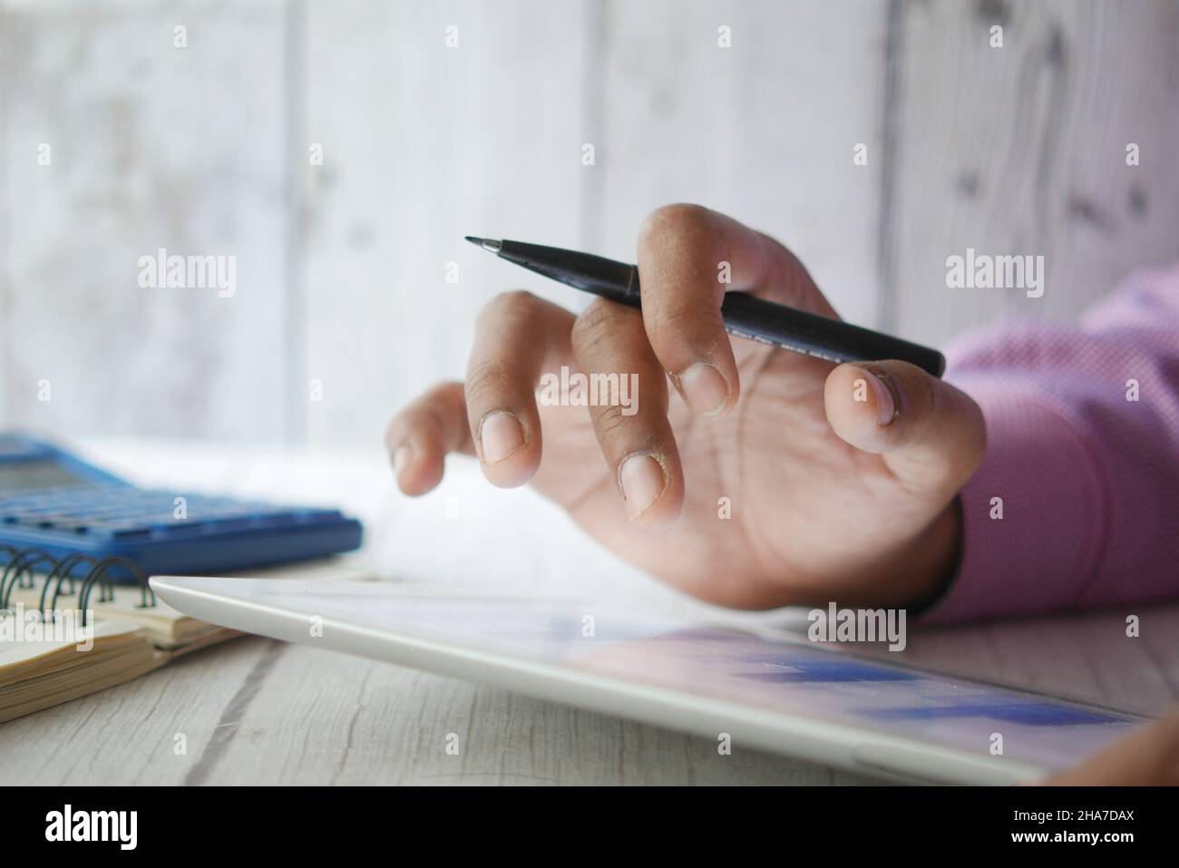 analyzing stock market data on digital tablet  Stock Photo