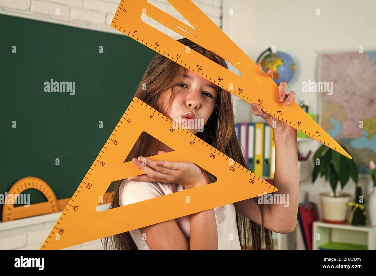 child in classroom school with geaometry triangle ruler, education ...