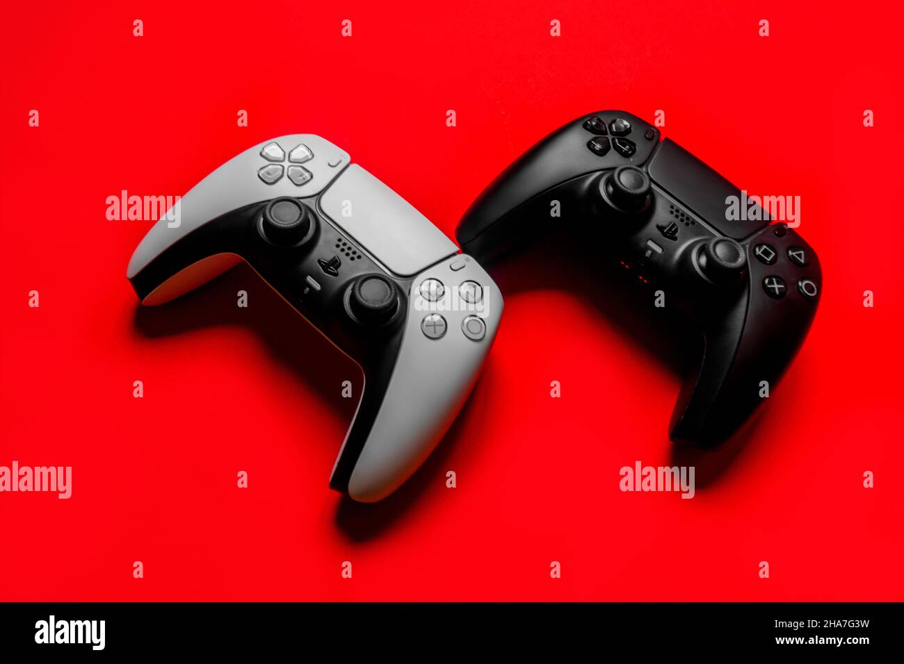 Ukraine - December 10, 2021.Wireless PlayStation 5 Dualsense gamepads. Stock Photo