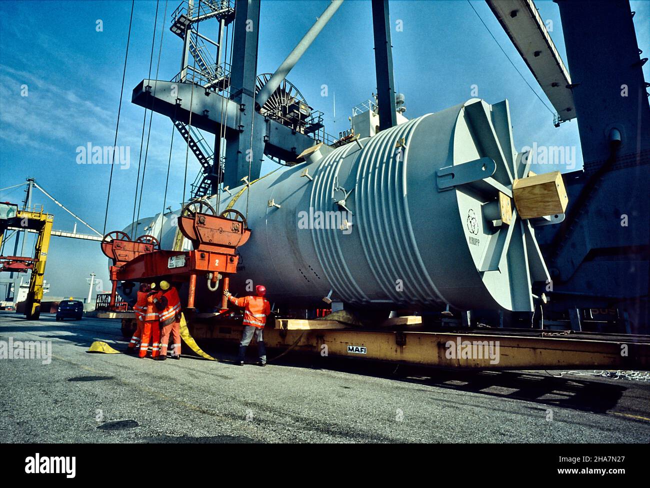 Heavy Plant Component, Boiler Tube, being lifted aboard a Container Vessel at Eurogate Container Terminal in the Port of Hamburg, Germany. Stock Photo