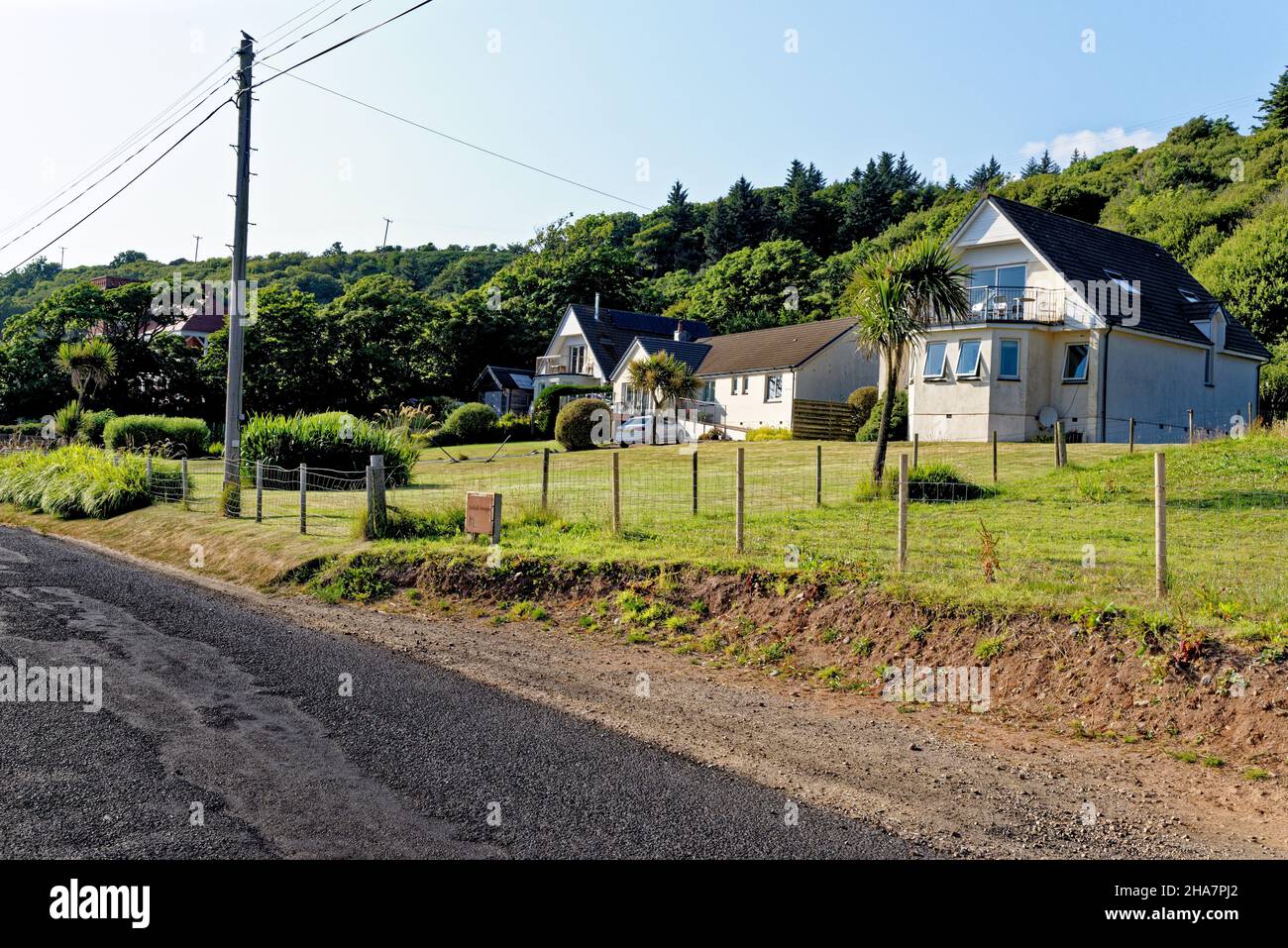 Terraced houses in Lamlash - Isle of Arran, North Ayrshire, Scotland, United Kingdom - 21st of July 2021 Stock Photo