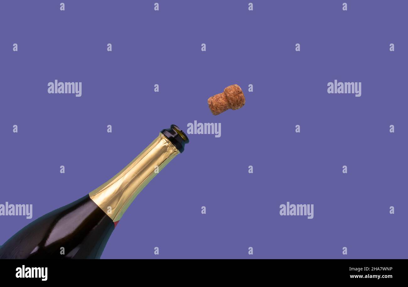 Popping cork open champagne bottle hi-res stock photography and
