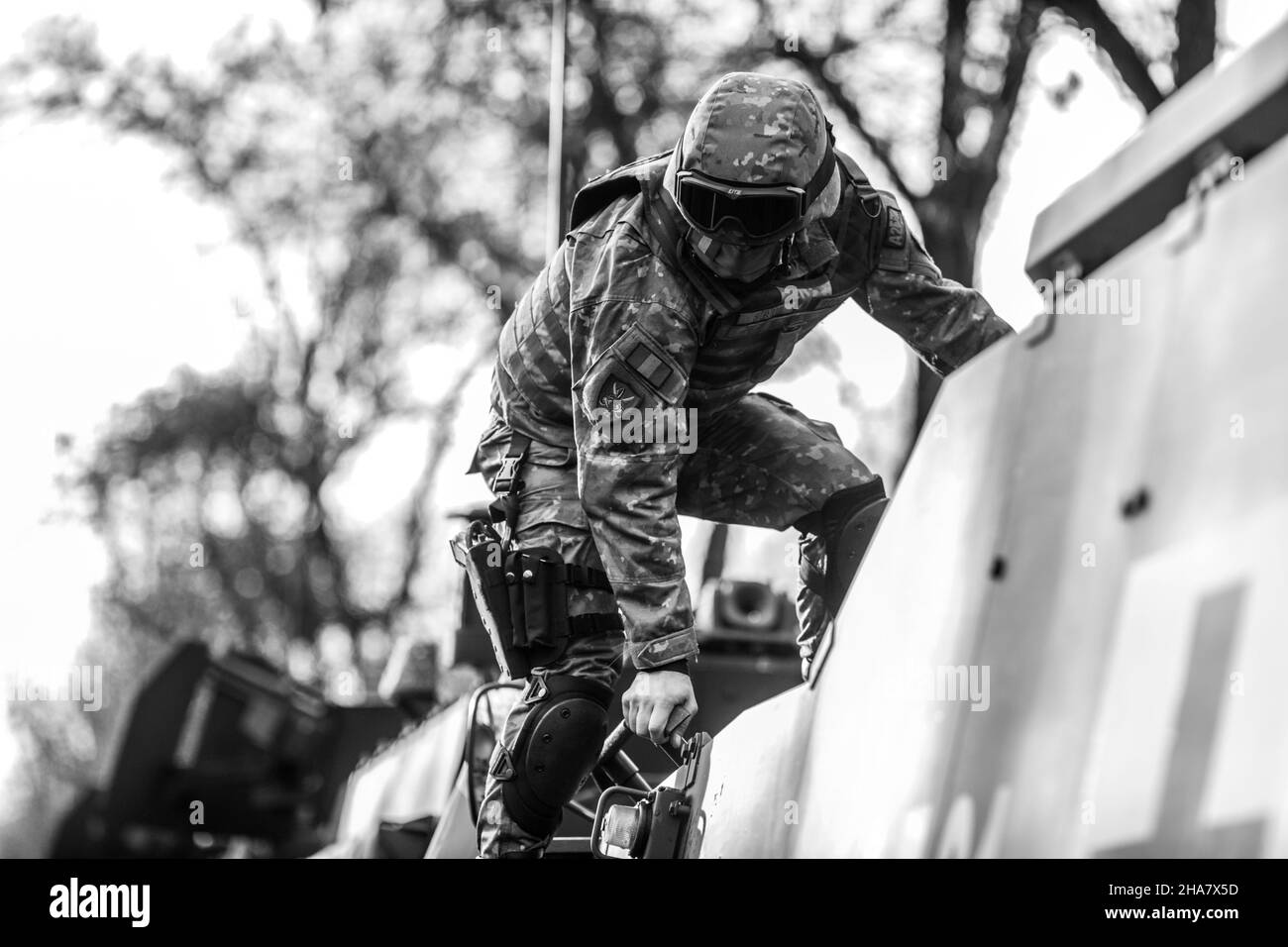 Bucharest, Romania - 1 December, 2021: Romanian army soldiers on Piranha V armored vehicles prepare for the Romanian national day military parade. Stock Photo