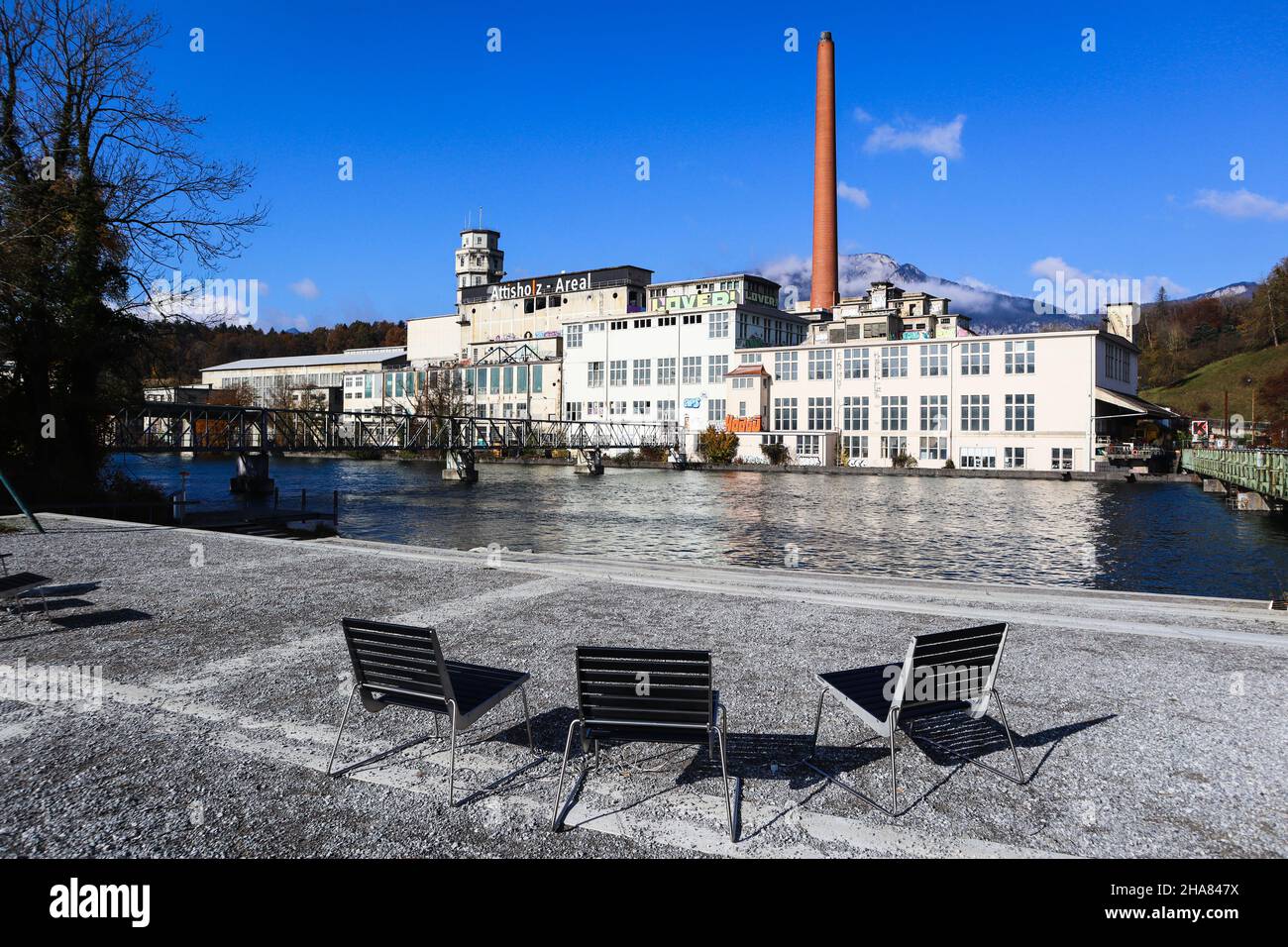 View over the Aare River to the abandoned Attisholz Industry Area in Switzerland Stock Photo