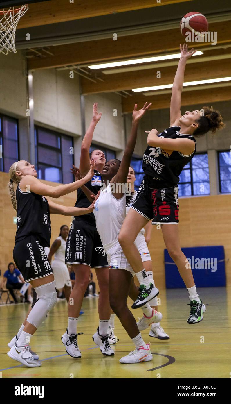 Duesseldorf, Germany. 11th Dec, 2021. Duesseldorf, Germany, Dec. 11, 2  Selma Yesilova (24 Marburg) wins the fight over a rebound during the 1.  Toyota Damen Basketball Bundesliga game between the Capitol Bascats