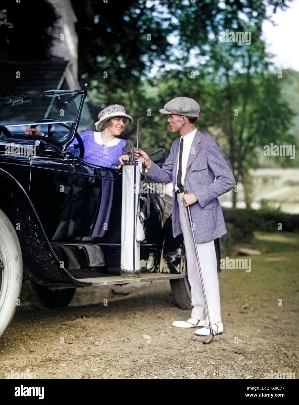 1920s COUPLE WOMAN MAN RESTING GOLF CLUB BAG ON 1922 LINCOLN CONVERTIBLE RUNNING BOARD UPSCALE COUNTRY CLUB GOLFING LIFESTYLE - m130c HAR001 HARS BEAUTY SUBURBAN COLOR GOLFER OLD TIME BUSY NOSTALGIA LINCOLN OLD FASHION AUTO FITNESS STYLE VEHICLE SAFETY TEAMWORK ATHLETE FIT PLEASED JOY LIFESTYLE SATISFACTION FEMALES HUSBANDS HEALTHINESS TRANSPORT COPY SPACE FRIENDSHIP FULL-LENGTH LADIES PERSONS INSPIRATION AUTOMOBILE MALES GOLFING CONFIDENCE TRANSPORTATION RESTING CLUBS GOALS SUCCESS HAPPINESS ADVENTURE LEISURE STYLES MOTOR VEHICLE AUTOS EXCITEMENT RECREATION PRIDE OPPORTUNITY MOTORING SMILES Stock Photo