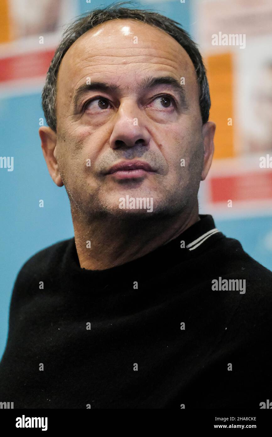 Domenico Lucano Mimmo, former pro-migrant mayor of Riace, A book by Domenico 'Mimmo' Lucano. Il fuorilegge', in a local bookshop during the presentation press conference in Pomigliano D'Arco, December 11, 2021 . Domenico Lucano Mimmo, former pro-migrant mayor of Riace, Stock Photo