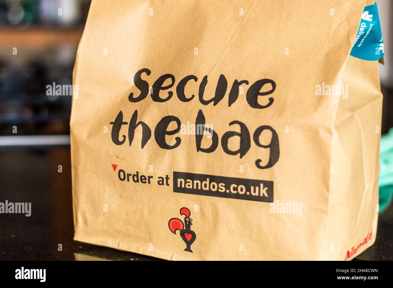 Nandos peri peri chicken take away packed in cardboard box for