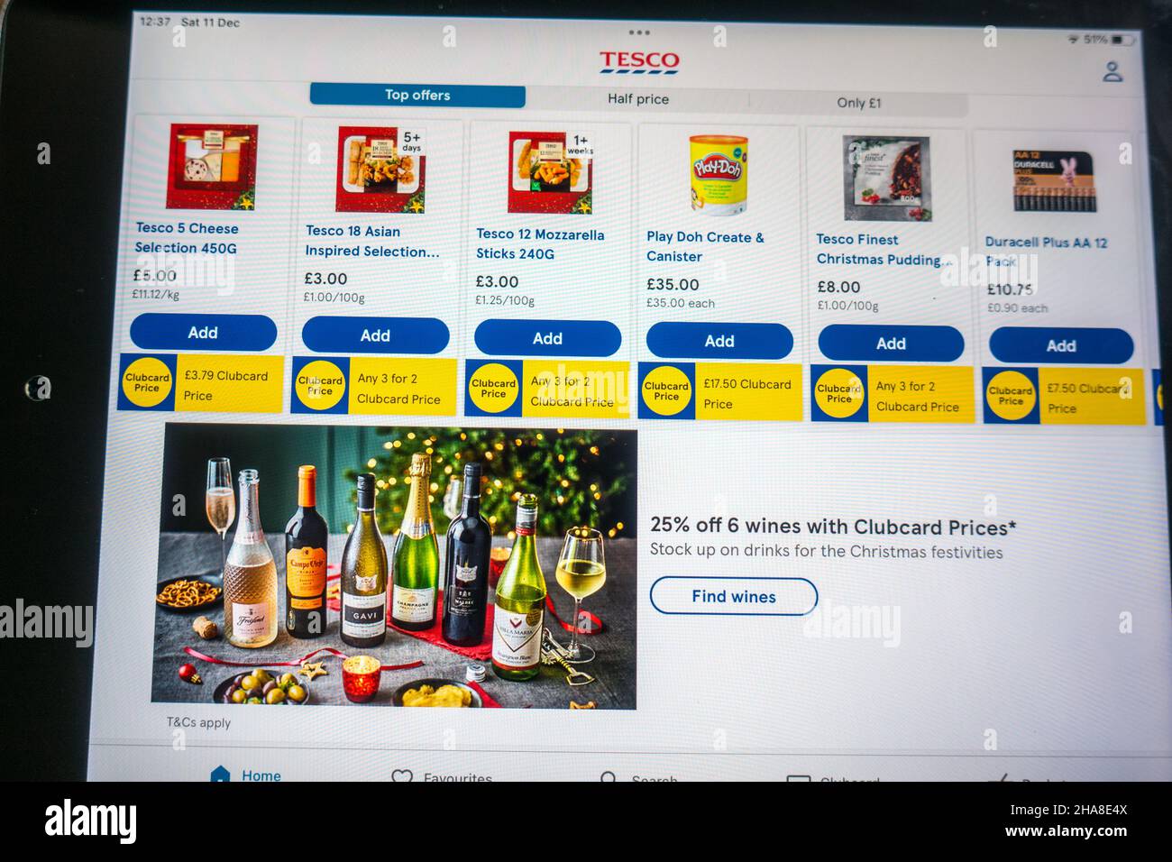 Tesco Clubcard price a reduced price offering available only for Clubcard holders, a push to collect and harness consumer data Stock Photo
