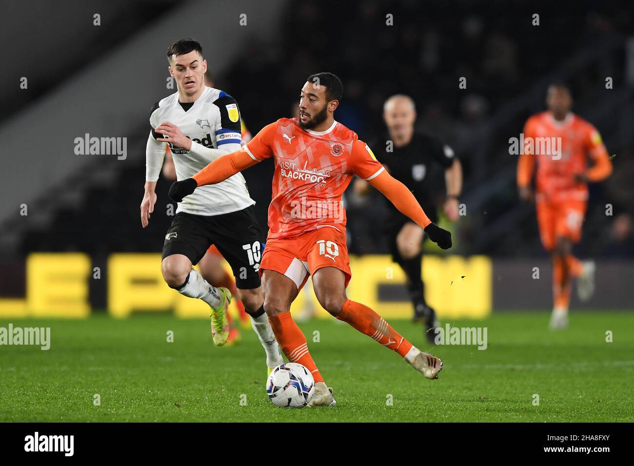DERBY, GBR. DEC 11TH Keshi Anderson of Blackpool in action during the Sky Bet Championship match between Derby County and Blackpool at the Pride Park, Derby on Saturday 11th December 2021. (Credit: Jon Hobley | MI News) Credit: MI News & Sport /Alamy Live News Stock Photo