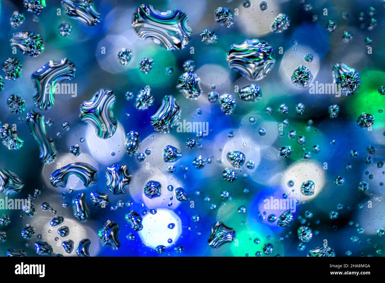 Oil droplets in water hi-res stock photography and images - Alamy