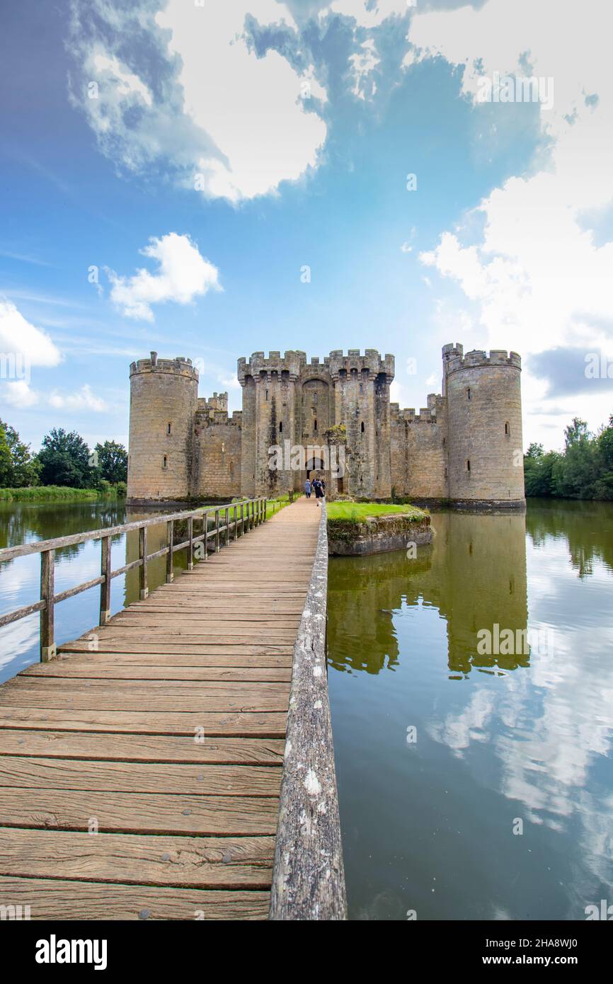 view across wooden bridge to 14thcentury moated Bodiam castle near