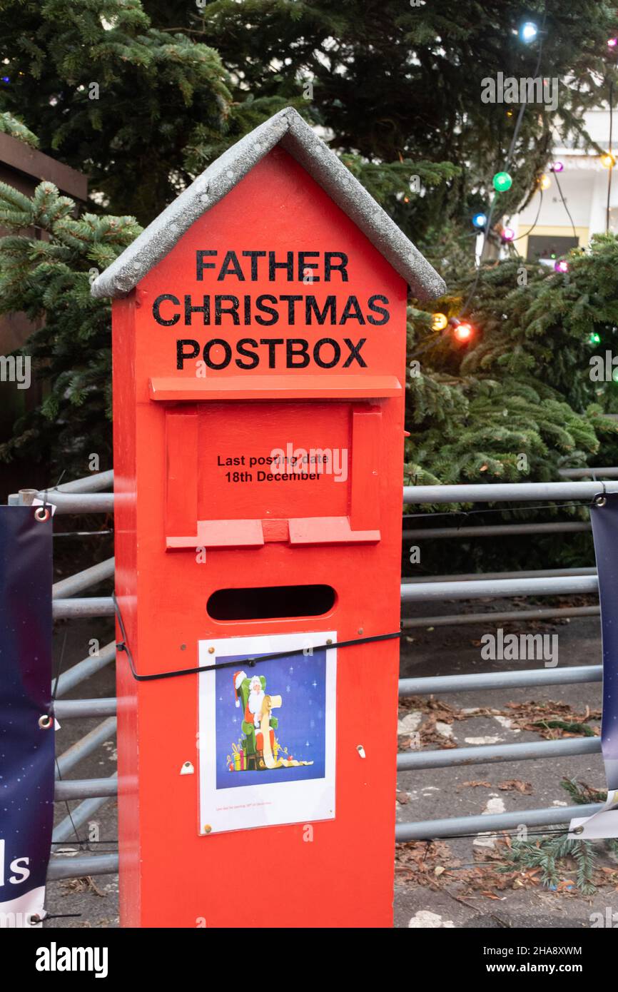 Father Christmas postbox and Christmas tree In Alresford, Hampshire, UK