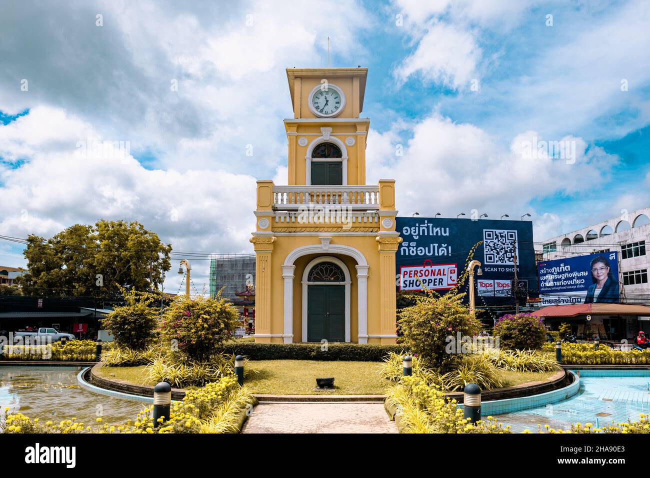 Phuket, Thailand - December 2021: Phuket Town Clock Tower in the roundabout in Phuket Town center, Thailand. A landmark of Phuket town, Stock Photo