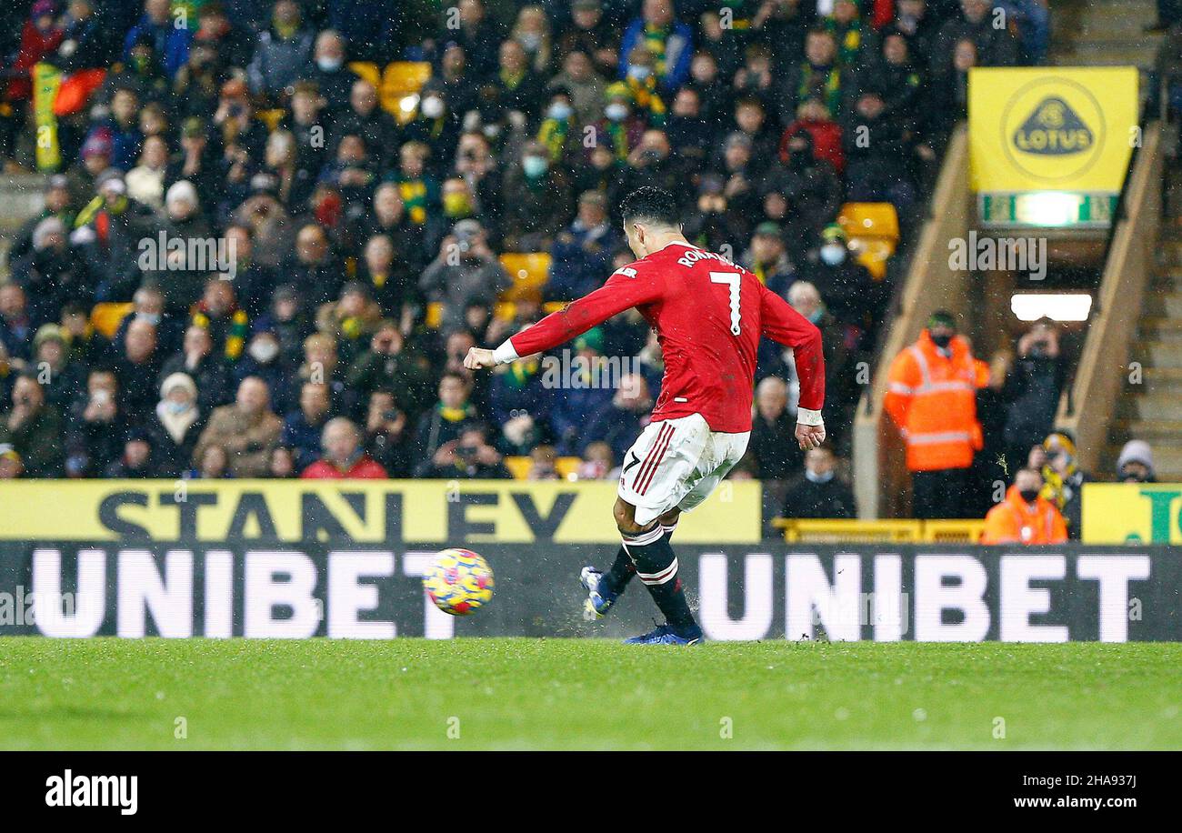 Norwich, UK. 11th Dec, 2021. Cristiano Ronaldo of Manchester United scores  the only goal of the game from the penalty spot during the Premier League  match between Norwich City and Manchester United
