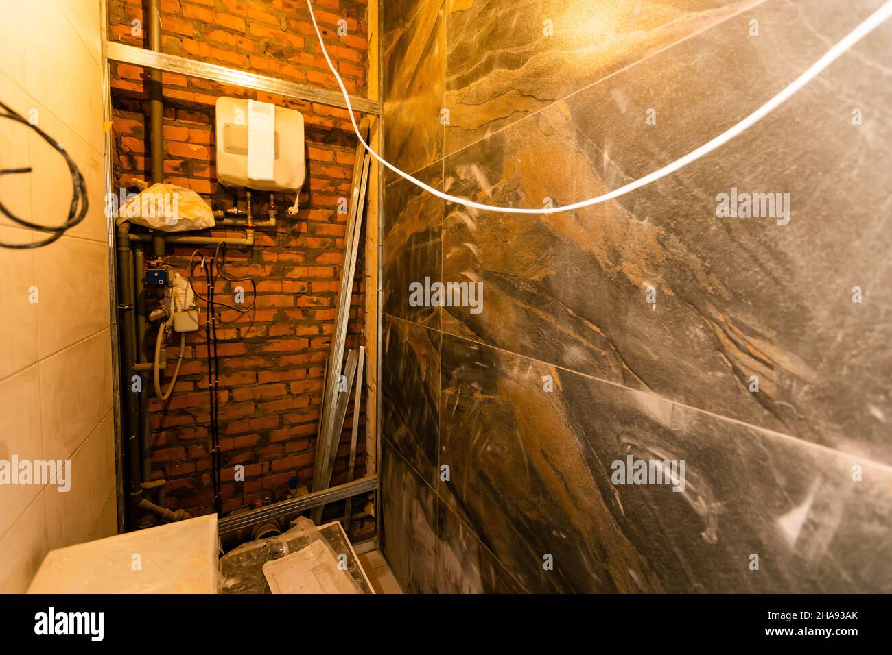 bathroom renovation removing tiles in apartment bathroom Stock Photo Alamy