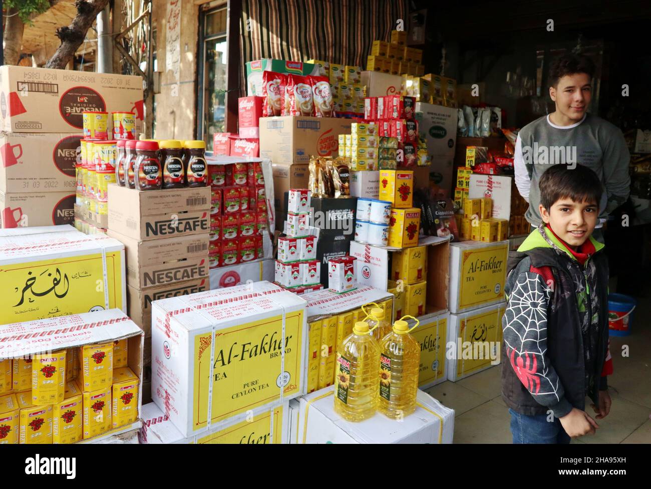 Shop boys seen on their workplace, Beirut, Lebanon, on December 11 2021.Last UNICEF report states that 77 percent of families in Lebanon lack food, and 60 percent of them buy food on credit or borrowing money. UN World Food Program estimates that poverty in Lebanon is now affecting 3 million people, compared to 1.7 million in 2020. Children are the main victims of this dire situation: begging and child labour are increasing, despite millions USD of international aid and child protection measures of WFP, UNICEF and UNHCR. (Photo by Elisa Gestri/ Sipa USA) Stock Photo