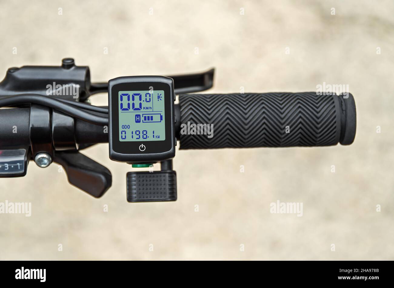 Hybrid electric bike control device. Electric accelerator trigger and LCD  display with speedometer, odometer, battery charge-discharge controller and  Stock Photo - Alamy