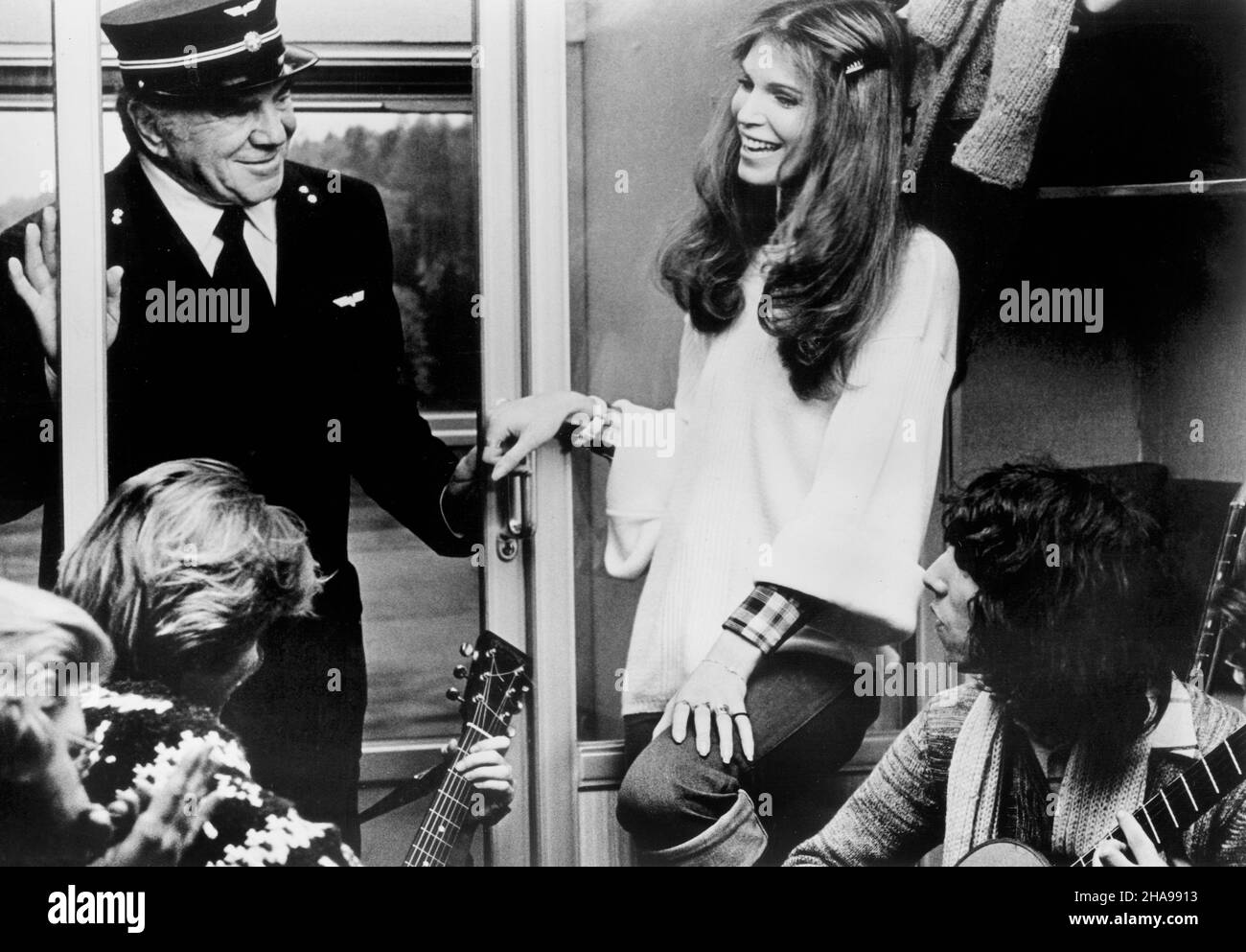 Lionel Stander (standing left), Ann Turkel (standing right), on-set of the Film, 'The Cassandra Crossing', AVCO Embassy Pictures, 1976 Stock Photo
