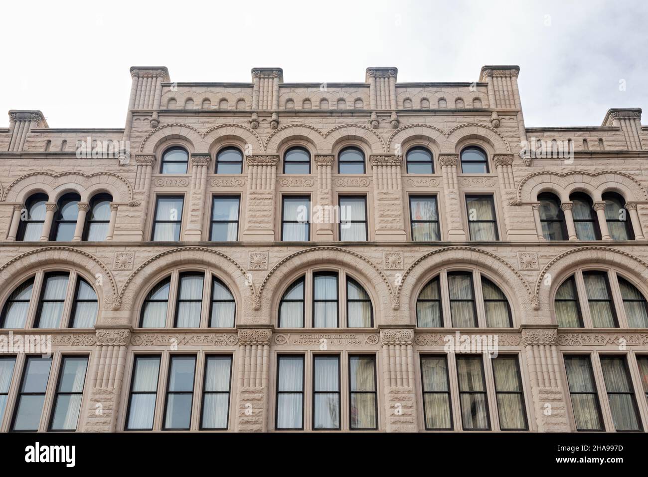 facade of historic landmark formerly loyalty building in milwaukee wisconsin of richardsonian romanesque style architecture Stock Photo