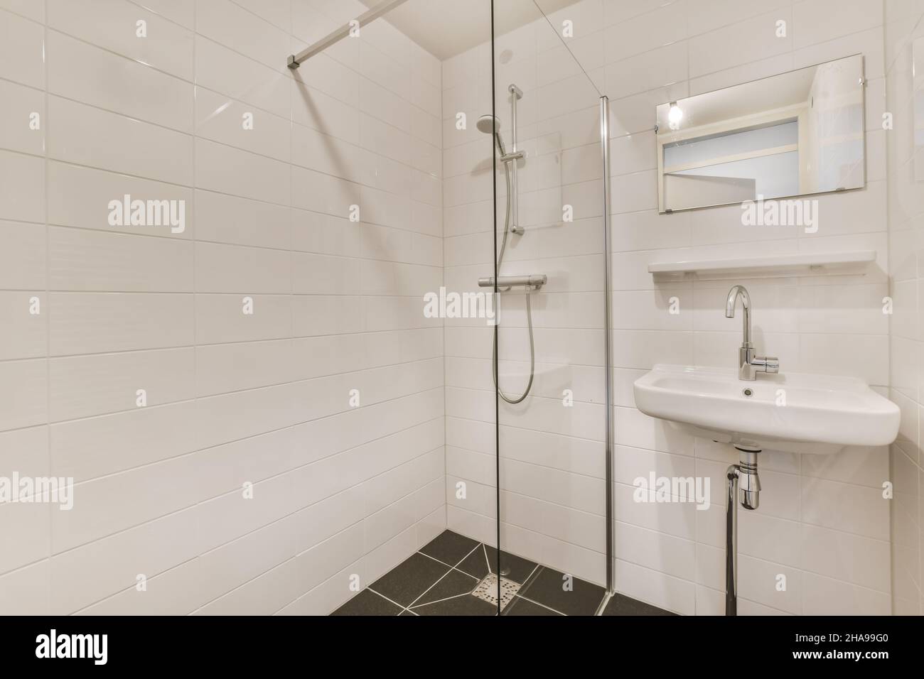 Interior design of attractive and cozy bathroom Stock Photo - Alamy