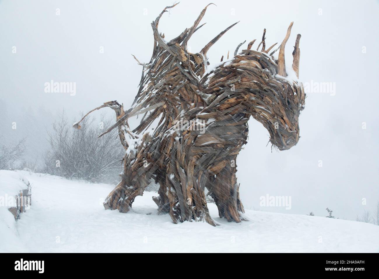Drago Vaia in Lavarone; The largest wooden dragon in Europe in Lavarone, Trentino Alto Adige. Stock Photo