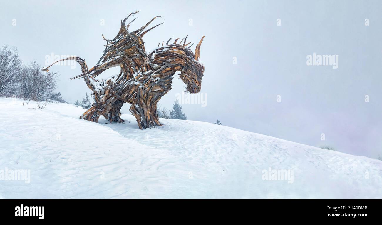 Drago di Vaia a Lavarone;Il drago in legno più grande d'Europa a Lavarone,Trentino Alto Adige. Stock Photo