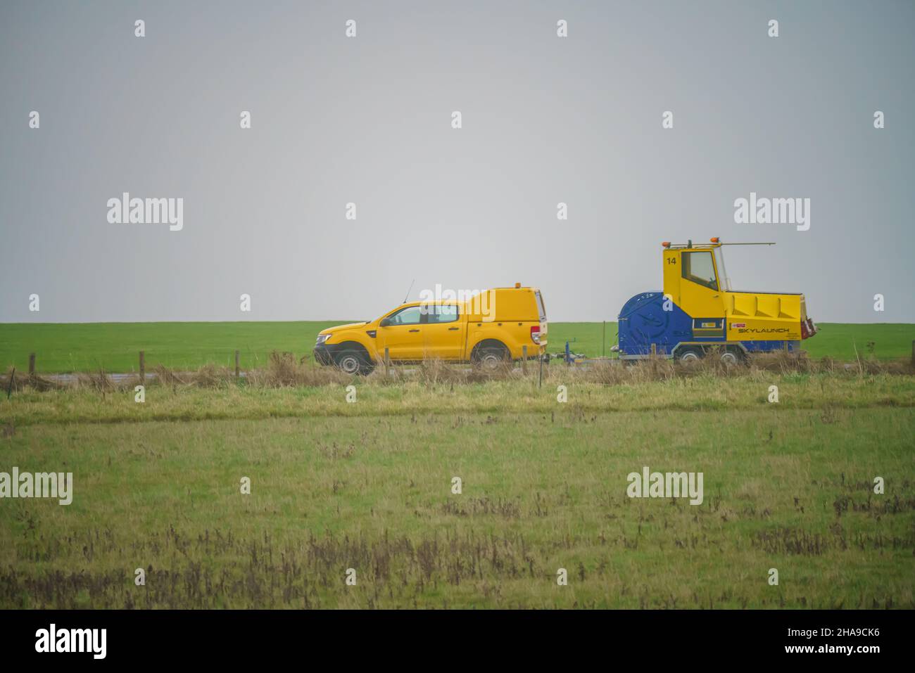 Skylaunch glider high speed cable winch launching system being towed at the end of an airfeld runway, Wiltshire UK Stock Photo