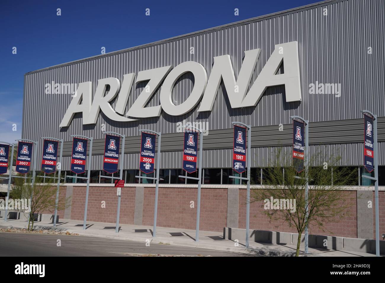 Arizona Wildcats NCAA championship banners for softball (1996, 1997 and 2001), men's basketball (1997)  women's golf (2000) are seen at the Cole and J Stock Photo