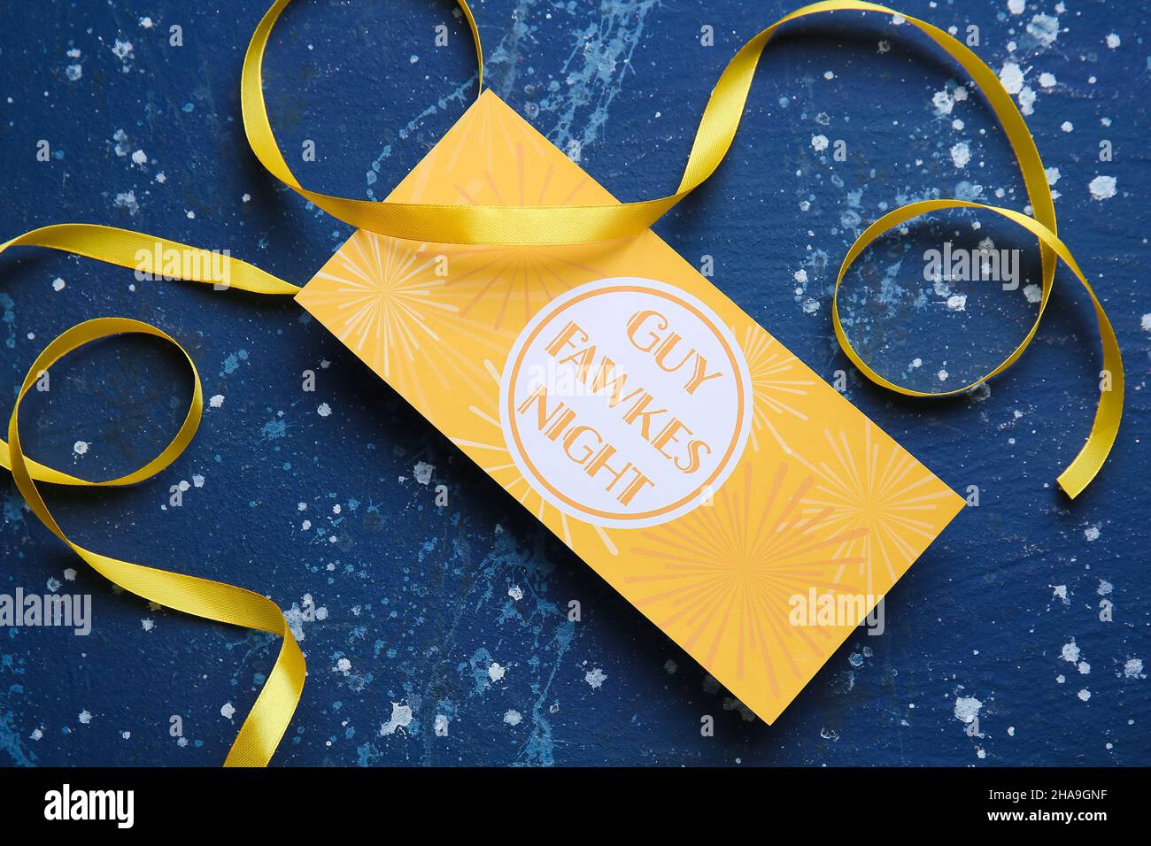 Greeting card for Guy Fawkes night and ribbon on color background Stock ...