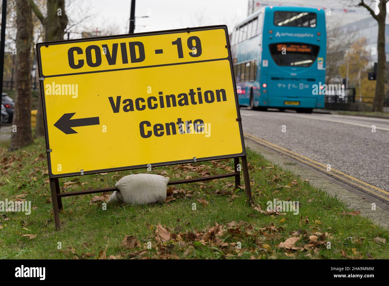 Milton Keynes, UK. 11th Dec, 2021. COVID-19 vaccination Centre road sign posted, welcome general public to take Coronavirus vaccine to combat the latest Omicron variant among the other variants in the Borough of Milton Keynes in Buckinghamshire England. Credit: xiu bao/Alamy Live News Stock Photo