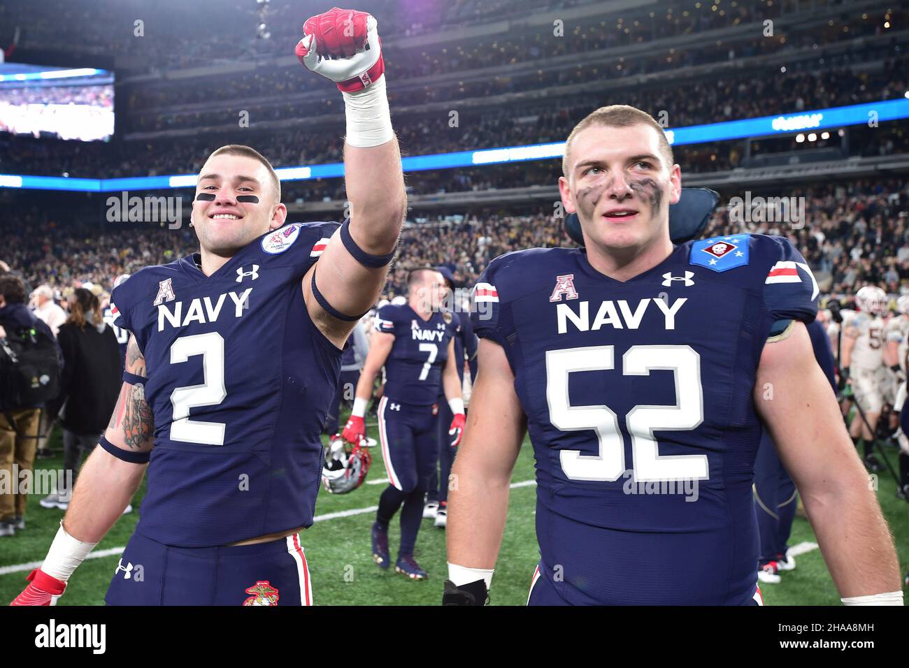 East Rutherford, New Jersey, USA. 11th Dec, 2021. Navy Midshipman safety JOE HUTSON (2) and Navy Midshipman offensive guard SEAN HARRIS (52) celebrate Navy???s victory over Army at MetLife Stadium in East Rutherford New Jersey Navy defeats Army 17 to 13 (Credit Image: © Brooks Von Arx/ZUMA Press Wire) Stock Photo